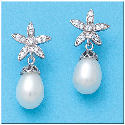 PENDIENTES FLOR ORO BLANCO 18KL